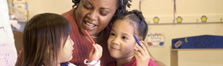 Photo of childcare worker and children